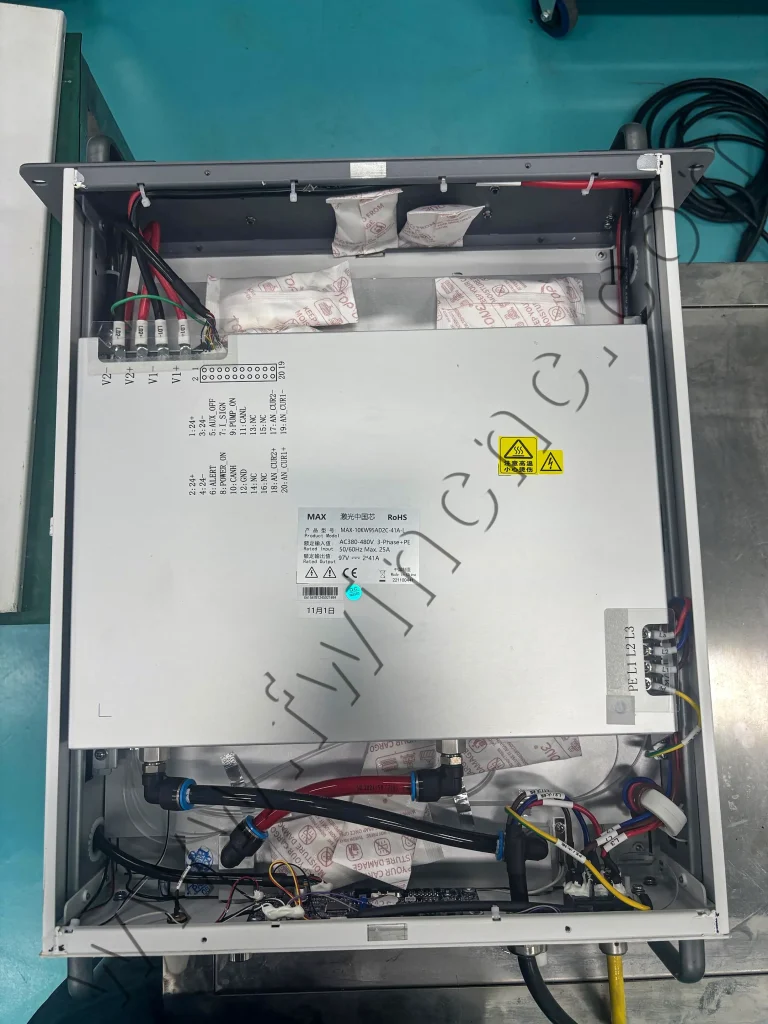 Fiber laser power supply with top cover removed for internal inspection